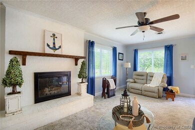 Custom blinds and ceiling fan.
