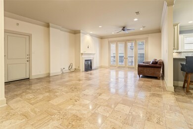 Living Room showing Balcony and Fireplace