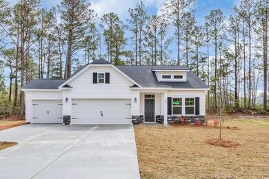 View of front of house featuring concrete driveway, stone siding, and a shingled roof