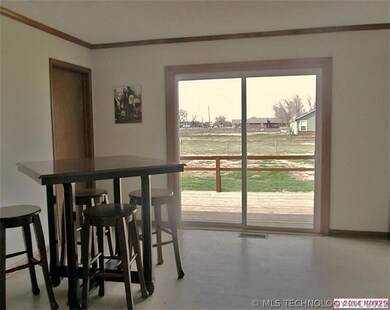 Dining room area. French doors goes onto back deck