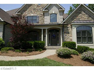 Exterior Front. Your first view of the lake is as you pull down your driveway!  BEAUTIFUL!