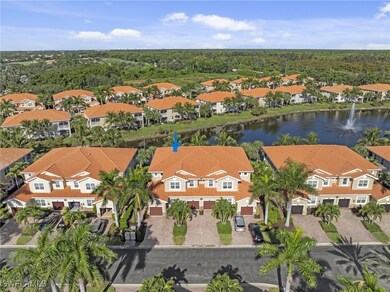 Aerial view of residential area with a large body of water