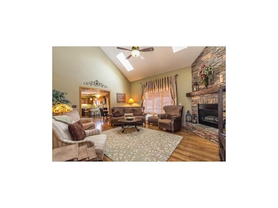 Spacious, bright great room flowing into kitchen, 