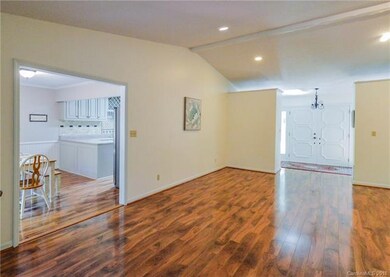 Breakfast area and kitchen are off of the living r
