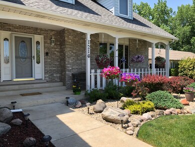 Welcoming porch is ideal for a swing