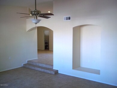 Living room leading to kitchen