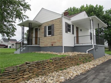 Covered front porch and covered side porch, with n