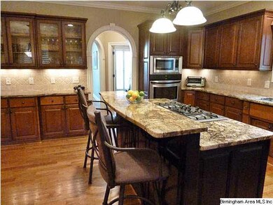 Breakfast bar with granite counter tops.