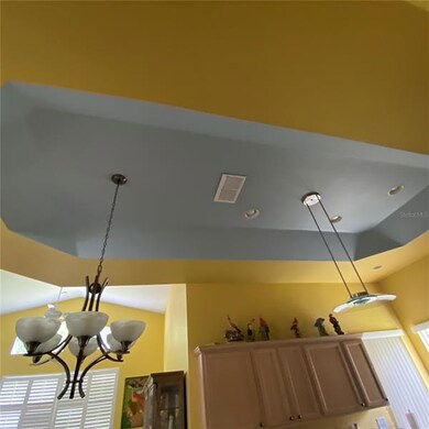 beautiful tray ceiling in kitche/dining