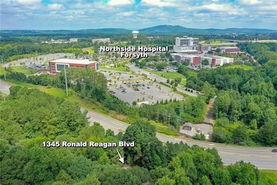 Drone / aerial view of a heavily wooded area