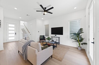 An open-concept living room seamlessly blends with
