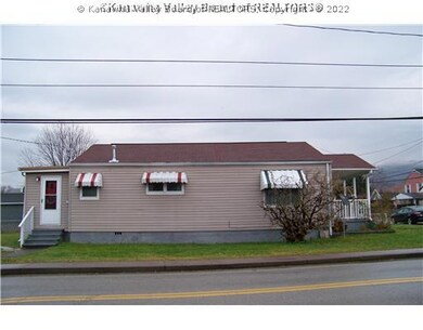 Other. Side view of home.