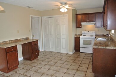 Tile floors in the spacious kitchen.