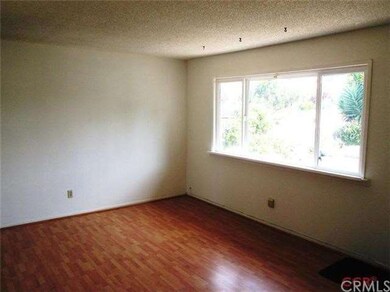 Living Room has a large picture window looking out