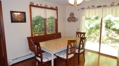 Large dining area with slider, and...