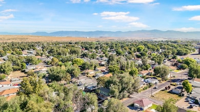 Aerial view of residential area with a mountainous background