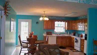 Looking into the kitchen and eating area from the living room