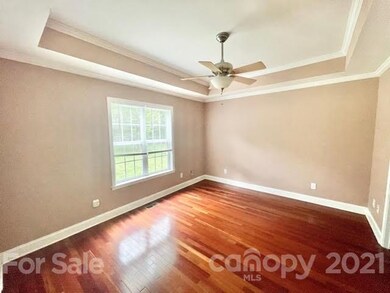 Primary Bedroom with tray ceiling