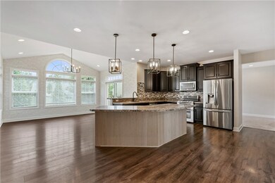 Kitchen with view into morning room.