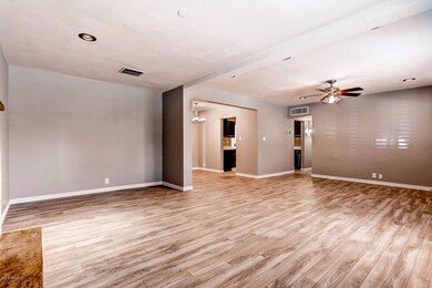 LIVING ROOM OPEN TO DINING AREA