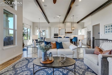 Wood Beams stretch through the GreatRoom and Kitch