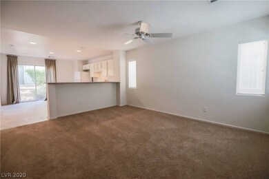 Downstairs great room, kitchen, and powder bath -