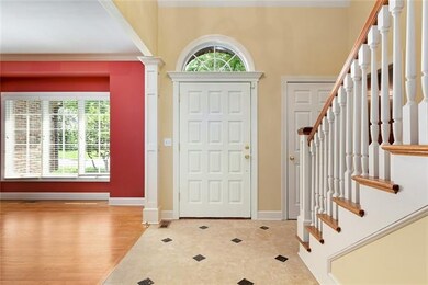 A view from the living room to the front door.