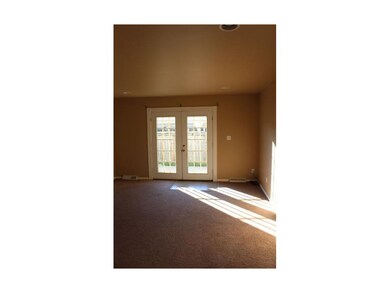 Living Room with French Doors onto back Patio
