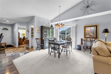 Living room with beautiful lighting, vaulted ceili