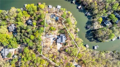 Close to 2 acres outlined with 3 permitted docks.