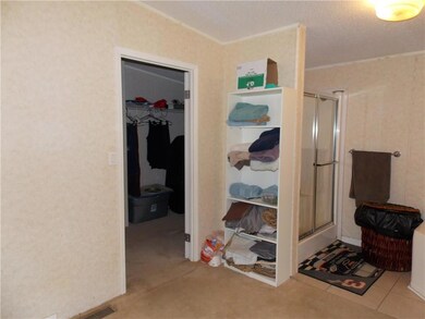 Separate shower and walk in closet in master bathr