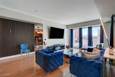 Living room featuring wood finished floors