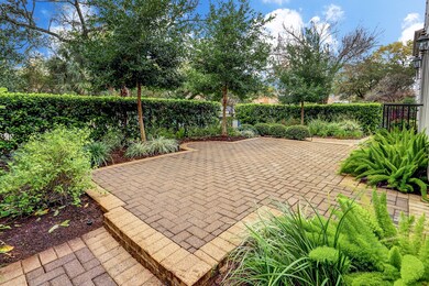 Tucked among manicured hedges and lush ground cove
