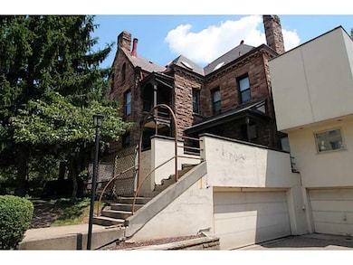 Exterior Front. View towards the unit with the gar