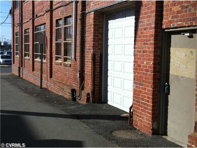 Exterior Back - Enter Studio directly through elec