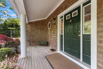 Gracious covered porch and entry.