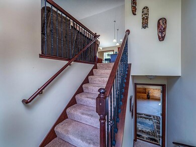 Entry Foyer and Stairs Down.jpg