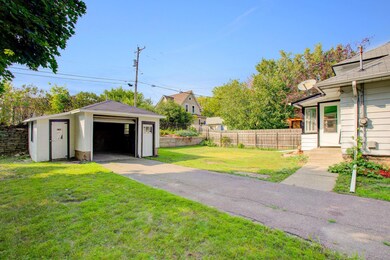 One car garage with great workshop on side