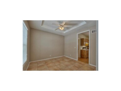 Large Formal Dining room, tiled floors for easy ca