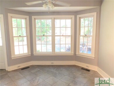 Kitchen Breakfast area overlooking backyard.