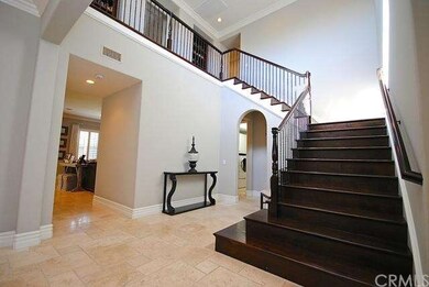â€¢ Walk up the Graceful Wood and Wrought Iron Sta