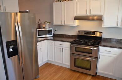 Bright open kitchen with stainless steel appliance