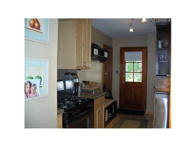 Another view of kitchen! Laminate flooring, maple 