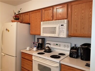 Half the kitchen, its bright and open