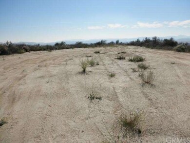 Rough graded pad, approximately 1/2 to 3/4 acre
