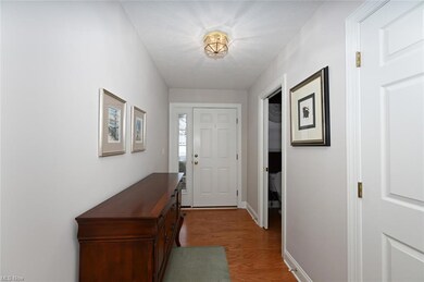 Doorway featuring hardwood flooring