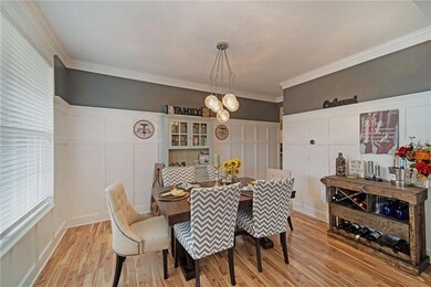 Formal dining room with wainscot detail.