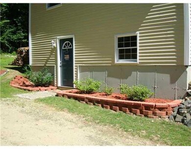 Exterior Front. Side view/landscaping