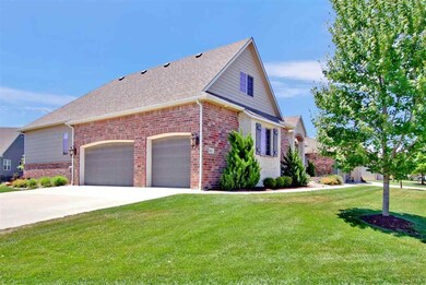 Wonderful corner lot with side entry garage that h