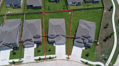 This home sits on a large corner lot with ample yard space in front and the back, lush landscaping and a well-maintained yard.